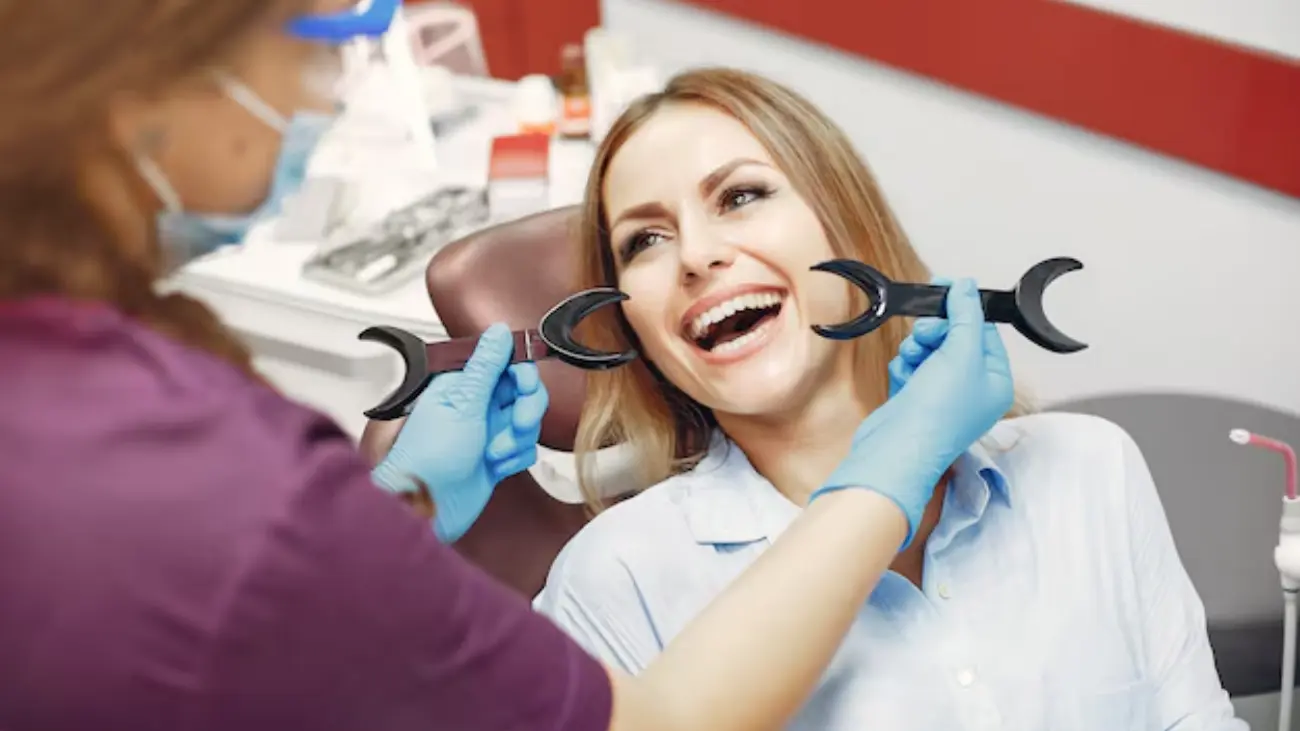 Dentist providing care at ATOS Medical Center