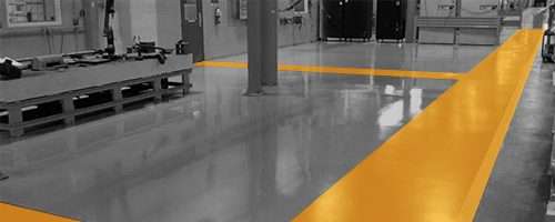 Freshly poured resin floor in an industrial hall