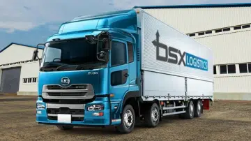 BSX Logistics curtain-side truck outside a warehouse