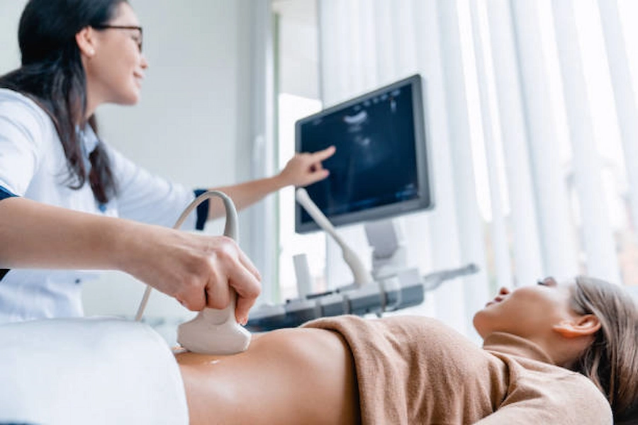 Patient receiving ultrasound therapy treatment session.