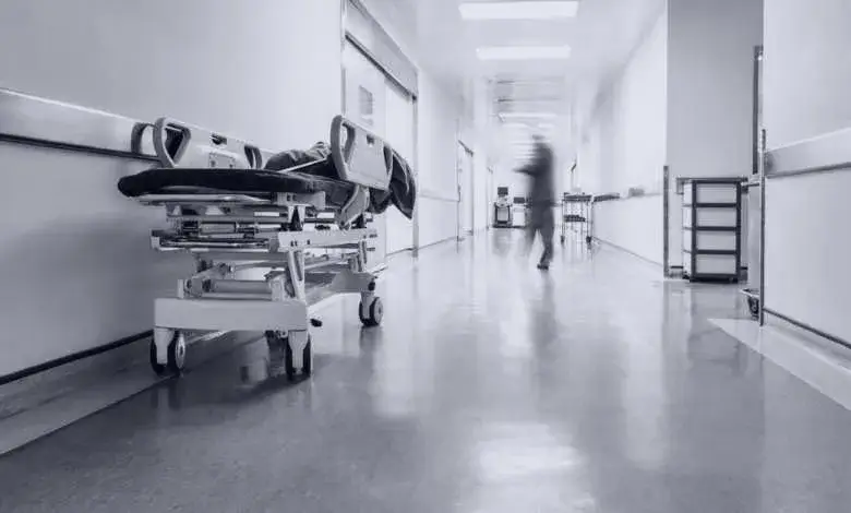 Hospital corridor with a gurney