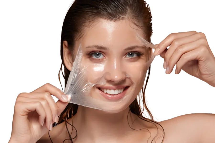 Woman removing a facial peel mask