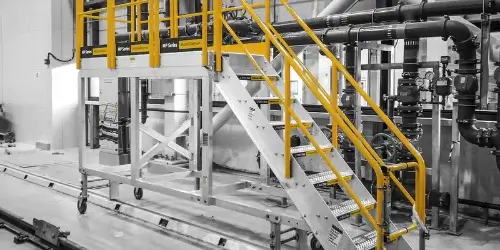 Mobile ladders and work platforms in a plant room
