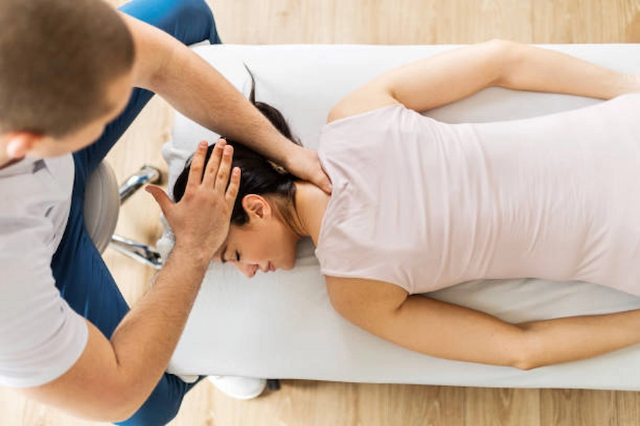 Patient engaged in neurological rehab therapy session.