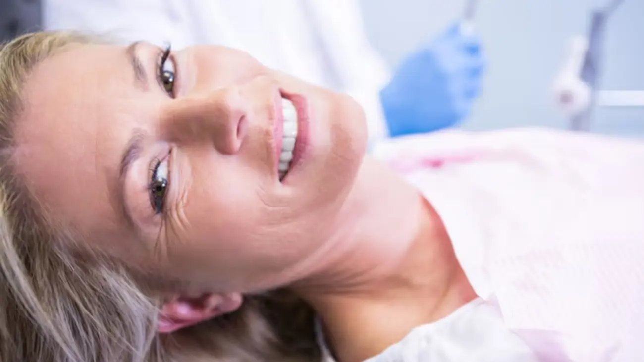 Comfortable fit of conventional dentures displayed.