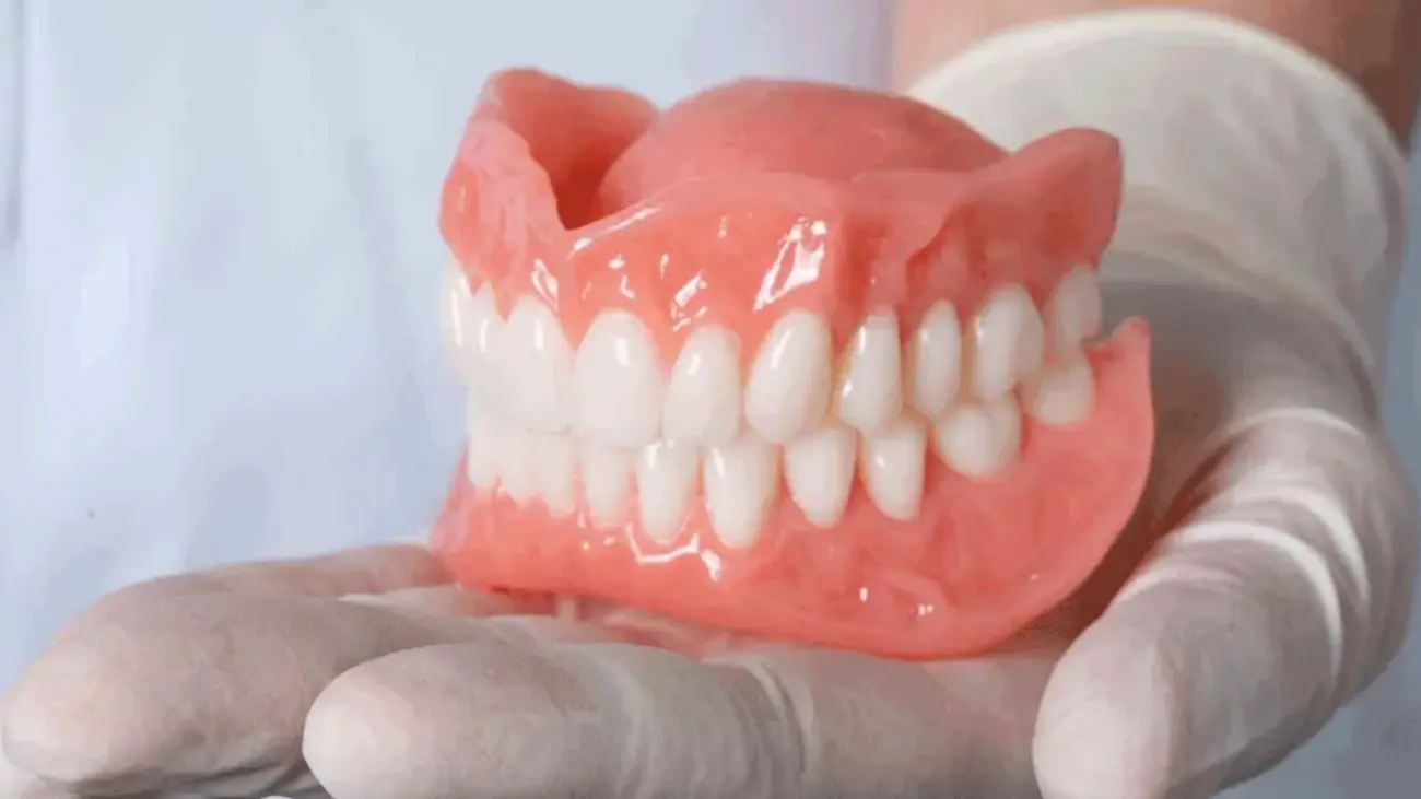 Image of rubber dentures highlighting flexibility and fit.