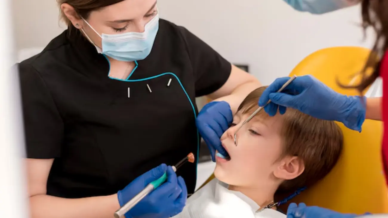 Compassionate pediatric dentist caring for young patients.