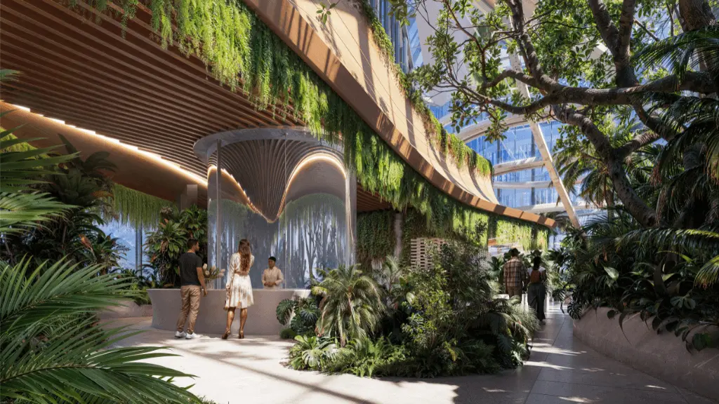 A planted walkway under a timber canopy