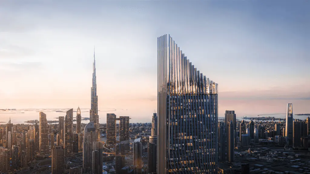 Tiger Sky Tower rising over the Dubai skyline at dusk